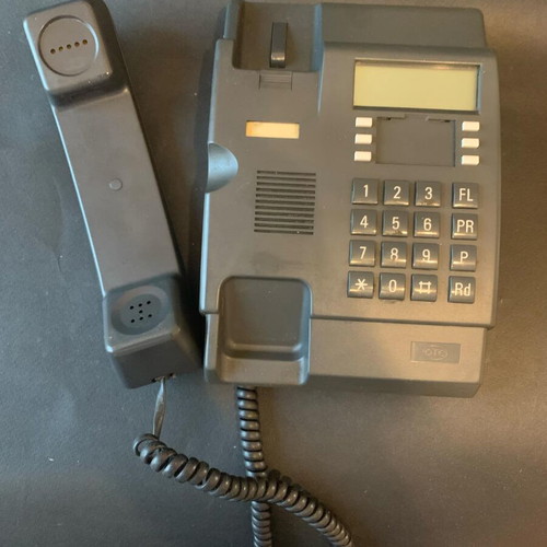 Wired phone used, gray, with non-working screen