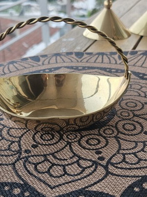 Brass decorative bowl with handle
