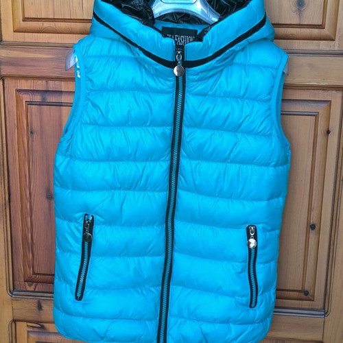 Turquoise vest used, size M