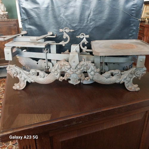 Cast iron antique scale used with lion and dragon decorations