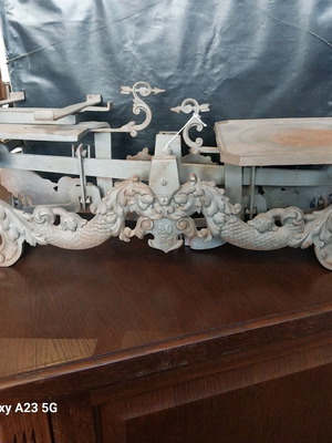 Cast iron antique scale used with lion and dragon decorations