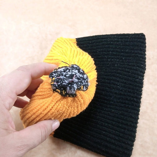 Warm multicolor acrylic hat used