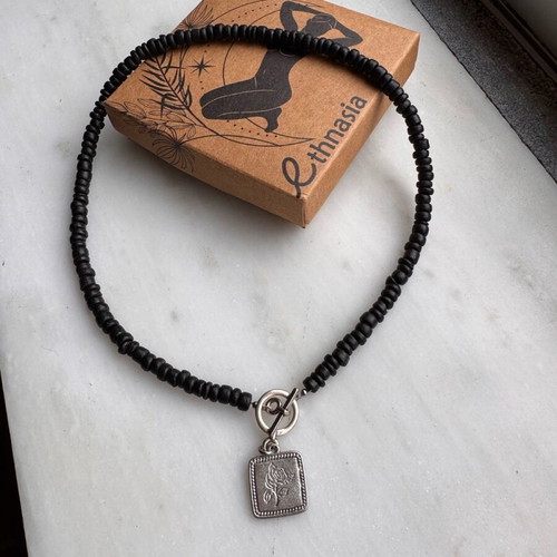 Ethnasia necklace used with black beads and rose charm