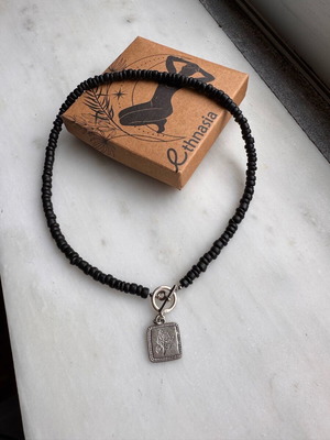 Ethnasia necklace used with black beads and rose charm