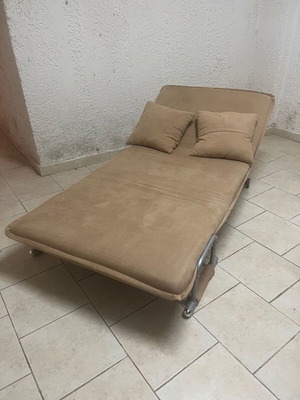 Sofa bed used with two pillows