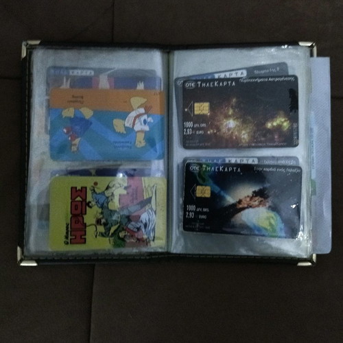 Collectible old phone cards with album used
