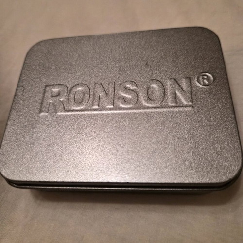 Ronson lighter like new with purchase tag