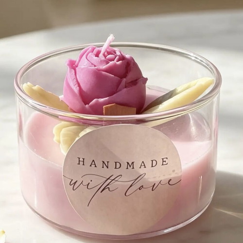 Handmade scented candle with rose in glass container, new