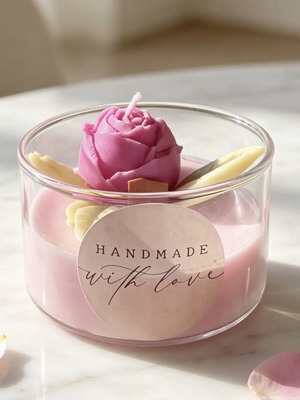 Handmade scented candle with rose in glass container, new
