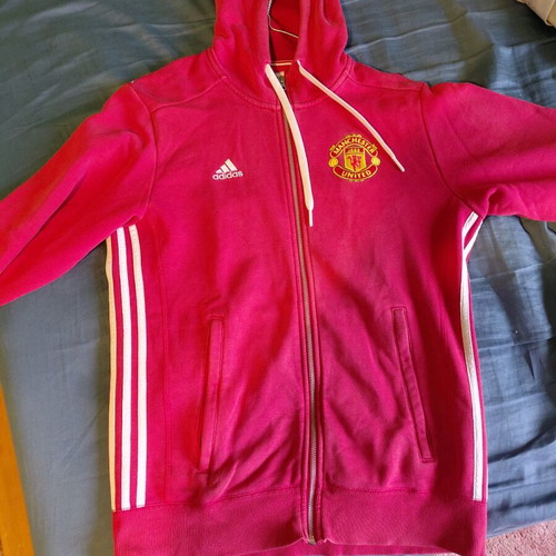 Manchester United jacket authentic used with small chlorine stain