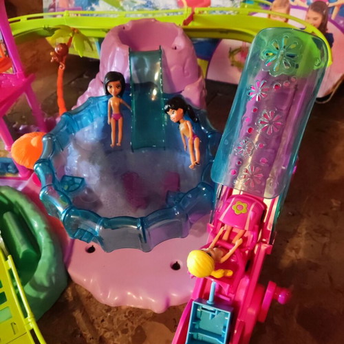 Polly Pocket Spin'n Surprise Waterpark playset used with 3 dolls and accessories