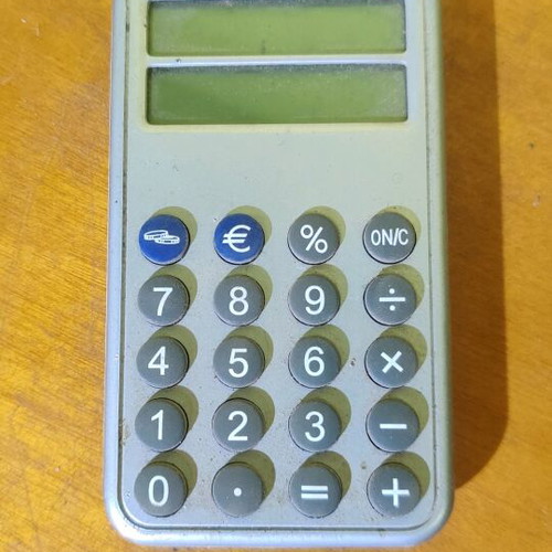 Pocket calculator used, small calculator