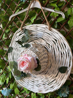 Decorative hat with fake flower and hanging wall decor like new