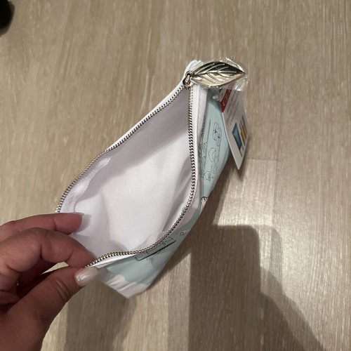 Clarins white bag with zipper new