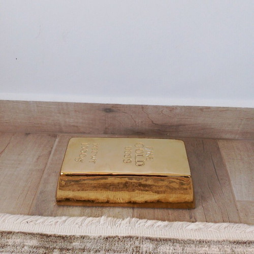 Gold-shaped piggy bank in excellent condition