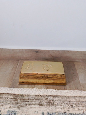 Gold-shaped piggy bank in excellent condition