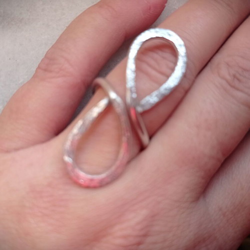 Silver ring with infinity symbol like new, adjustable size
