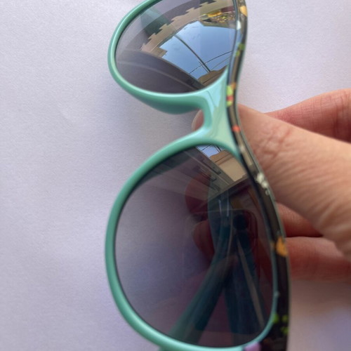 Stella McCartney Kids Sunglasses used, turquoise frame with colorful design