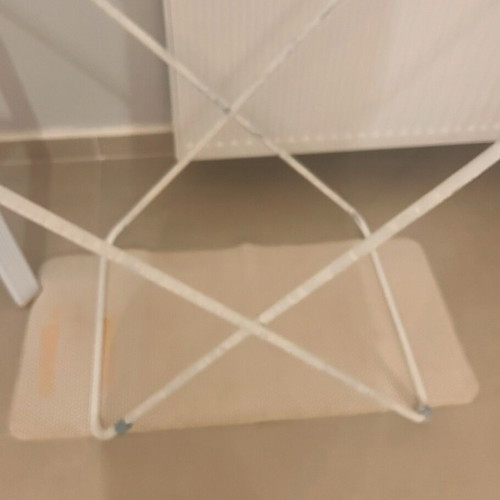 Drying rack used with white paint on legs
