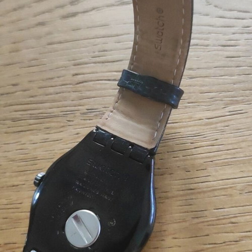 Swatch Black Nachtigall wristwatch YWB403, black dial with rose gold accents