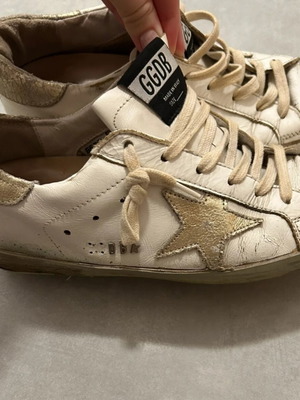 Golden Goose women's shoes with star design
