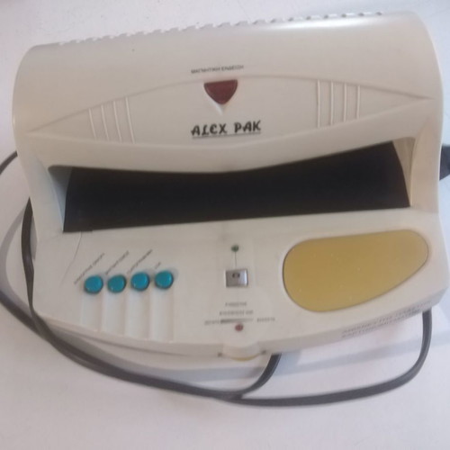 Alex Pack counterfeit banknote detector used