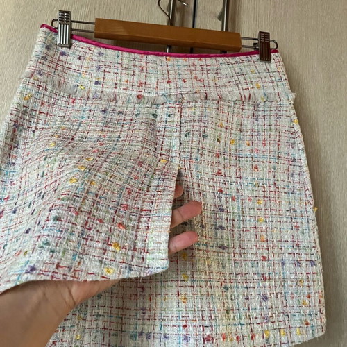Mini tweed skirt with cutouts like new, XS