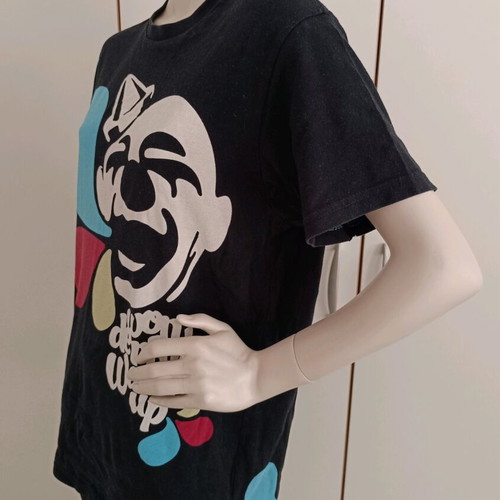 Women's black short-sleeve t-shirt with clown print like new, size M