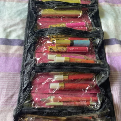Cosmetics set new with 11 lipsticks, 5 lip pencils, 7 double eye pencils, eyeliner, mini eyeshadow palette, blush, lip balm, and gift pouch