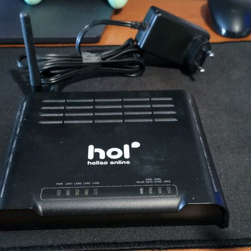 Three old routers, fully functional