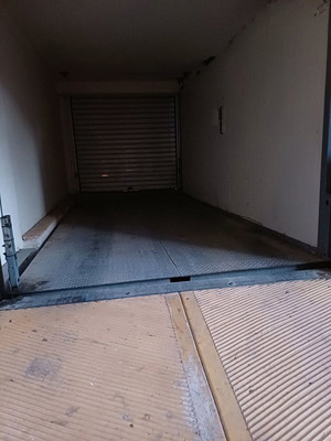 Underground parking space with car elevator, Athens Three Bridges