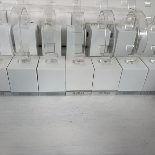Guess 26 bases for bracelets or watches, like new, display stands set