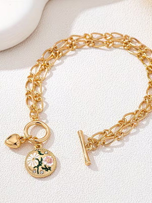 Bracelet with flower and heart pendant new