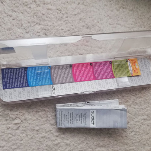 Swatch watch box used with documents