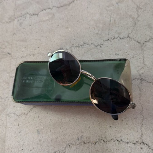 Children's sunglasses used, silver color