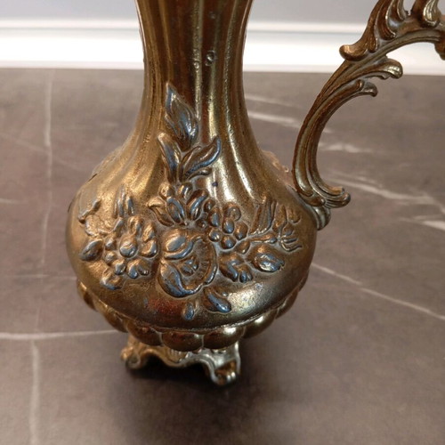 Metal container used with embossed design and handle