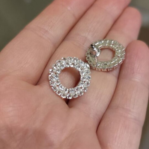 Silver earrings new with small zircons
