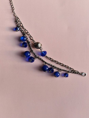 Bracelet with blue beads like new