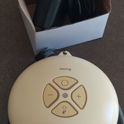 Medela Swing breast pump like new, battery and electric powered