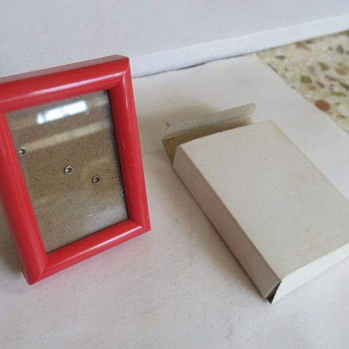 Small red photo frame new with stand and wall hooks