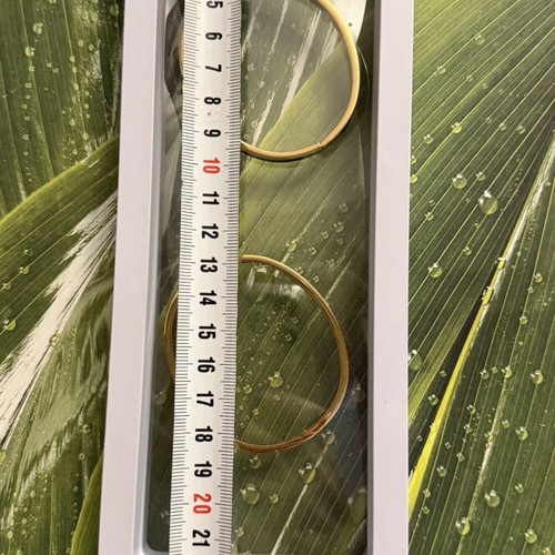 Set of 2 steel bracelets with gold and black details, new