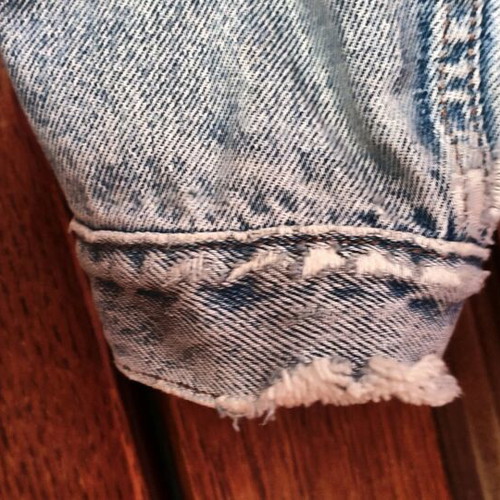 Levis jacket men's used, blue, size L with minor sleeve wear