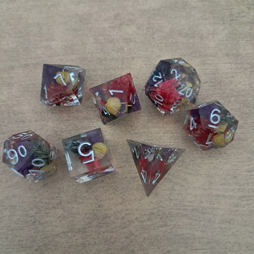 Summer meadow D&D dice set with colorful flowers inside