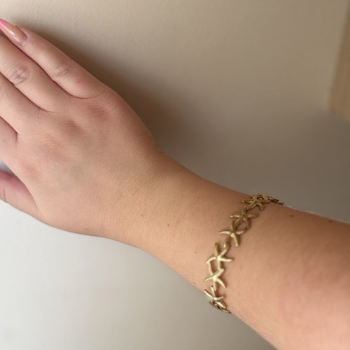 Gold Stainless Steel Bracelet with Starfish Design like new