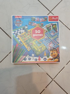 Paw Patrol board game with 50 games like new