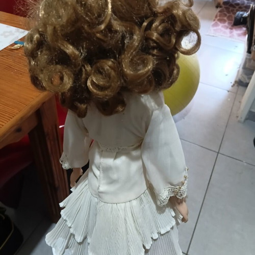 Porcelain doll in excellent condition