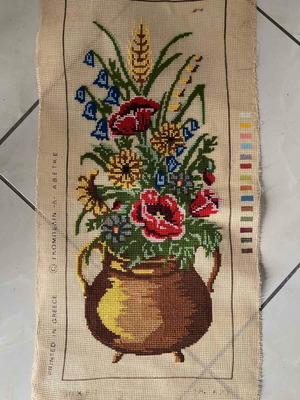 Handmade embroidery artwork with wildflowers in copper pot like new