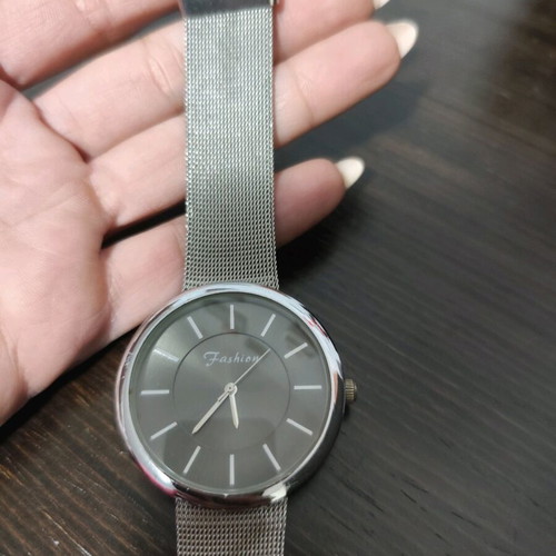 Steel watch like new with woven chain