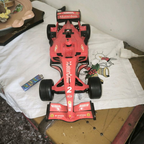 Formula 1 toy car with friction and sounds, red, like new
