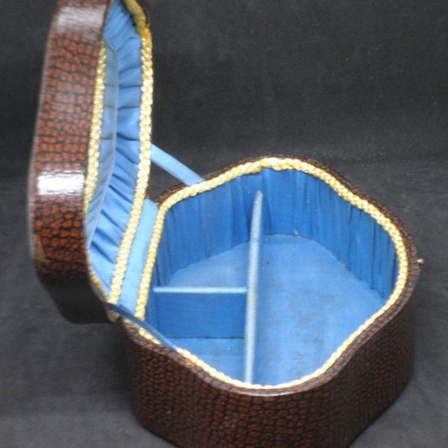 Antique jewelry box used, brown color with blue fabric interior
